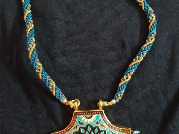 Thewa gold-on-glass jewellery art